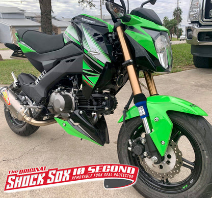 A Kawasaki street bike with blue 4U Shock Sox.