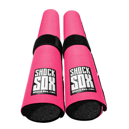 Pair of pink 13in Shock Sox on a white background
