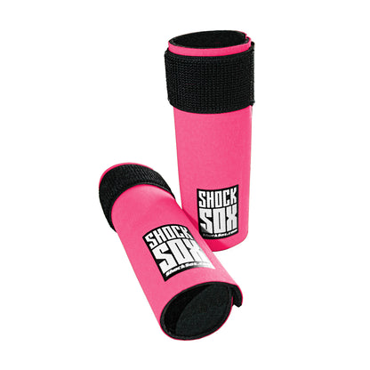 Pair of pink 6U Shock Sox on a white background