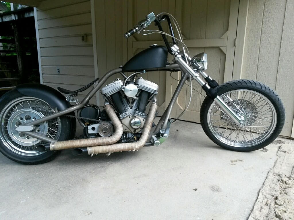 A picture of a street bike with black Shock Sox on it.