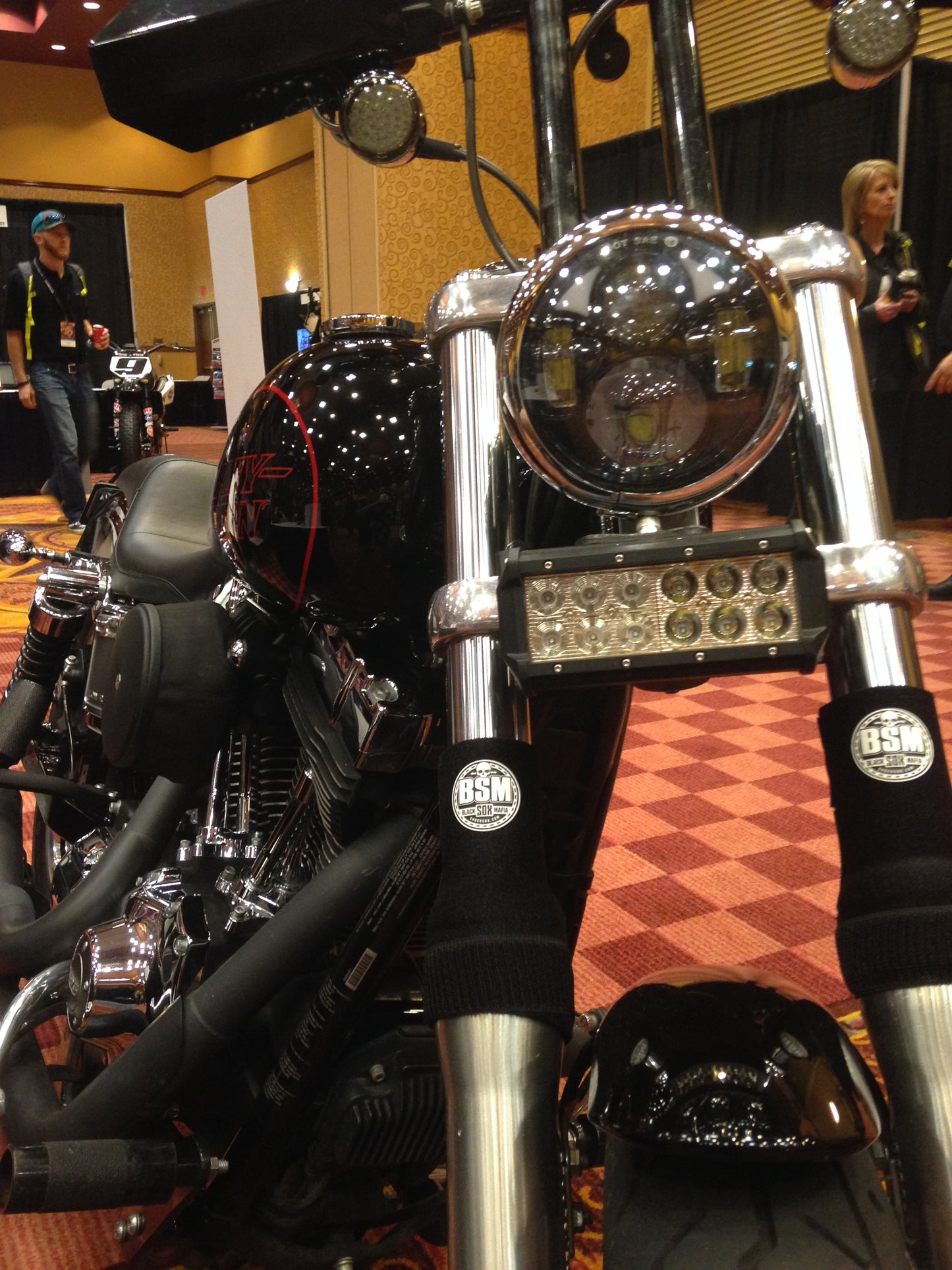 A picture of a street bike with black Shock Sox on it.