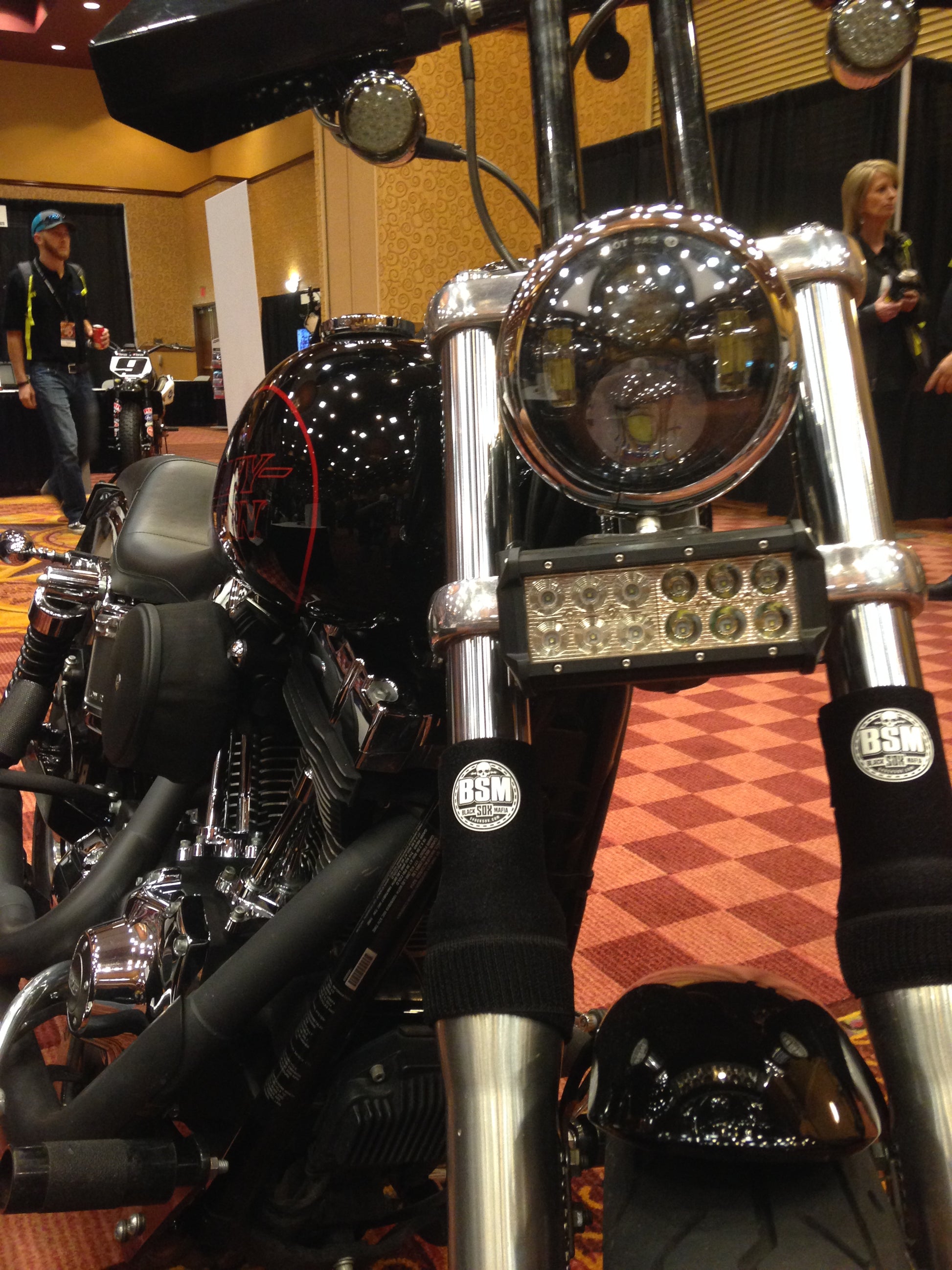 A picture of a street bike with black Shock Sox on it.