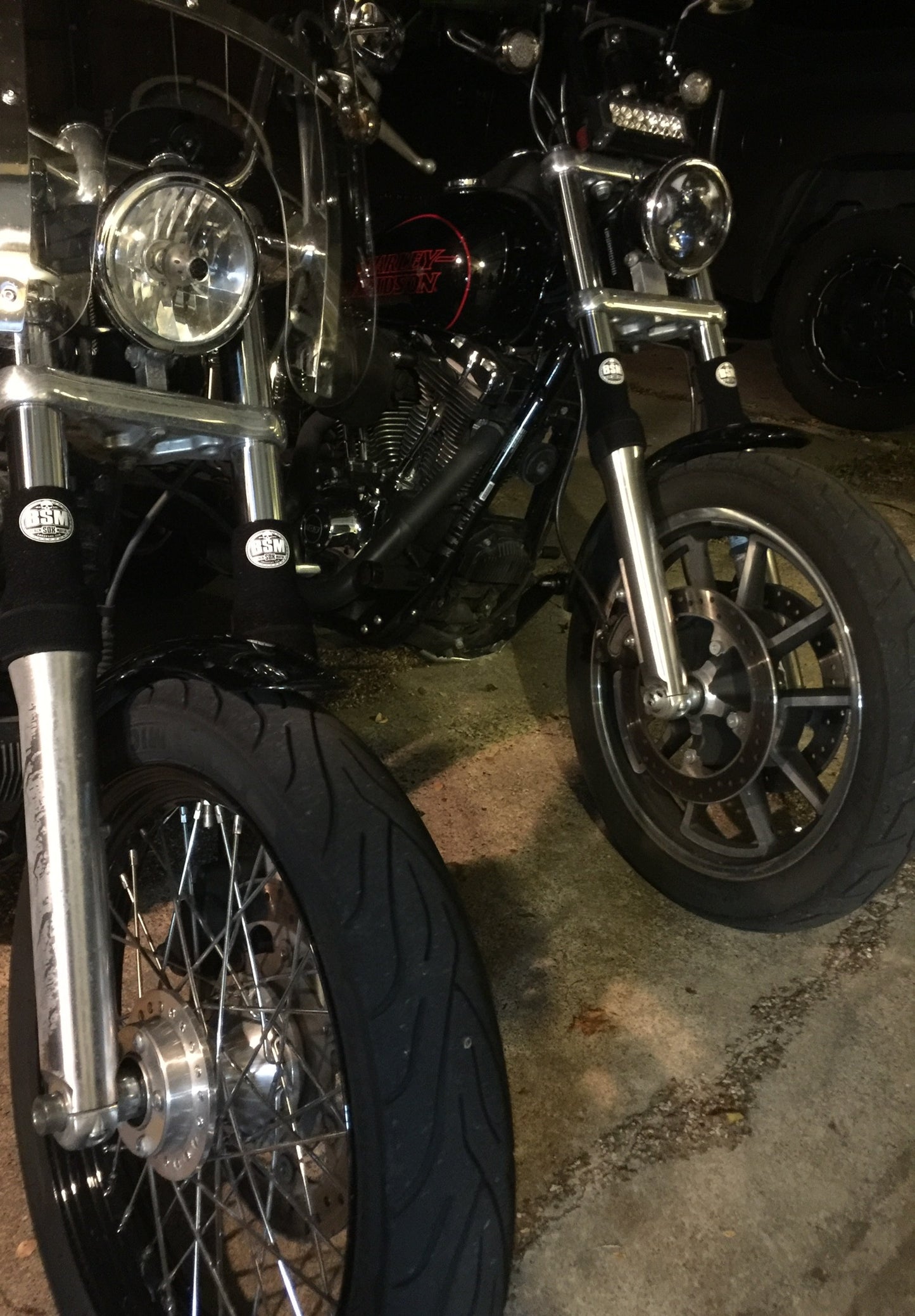 A picture of a street bike with black Shock Sox on it.