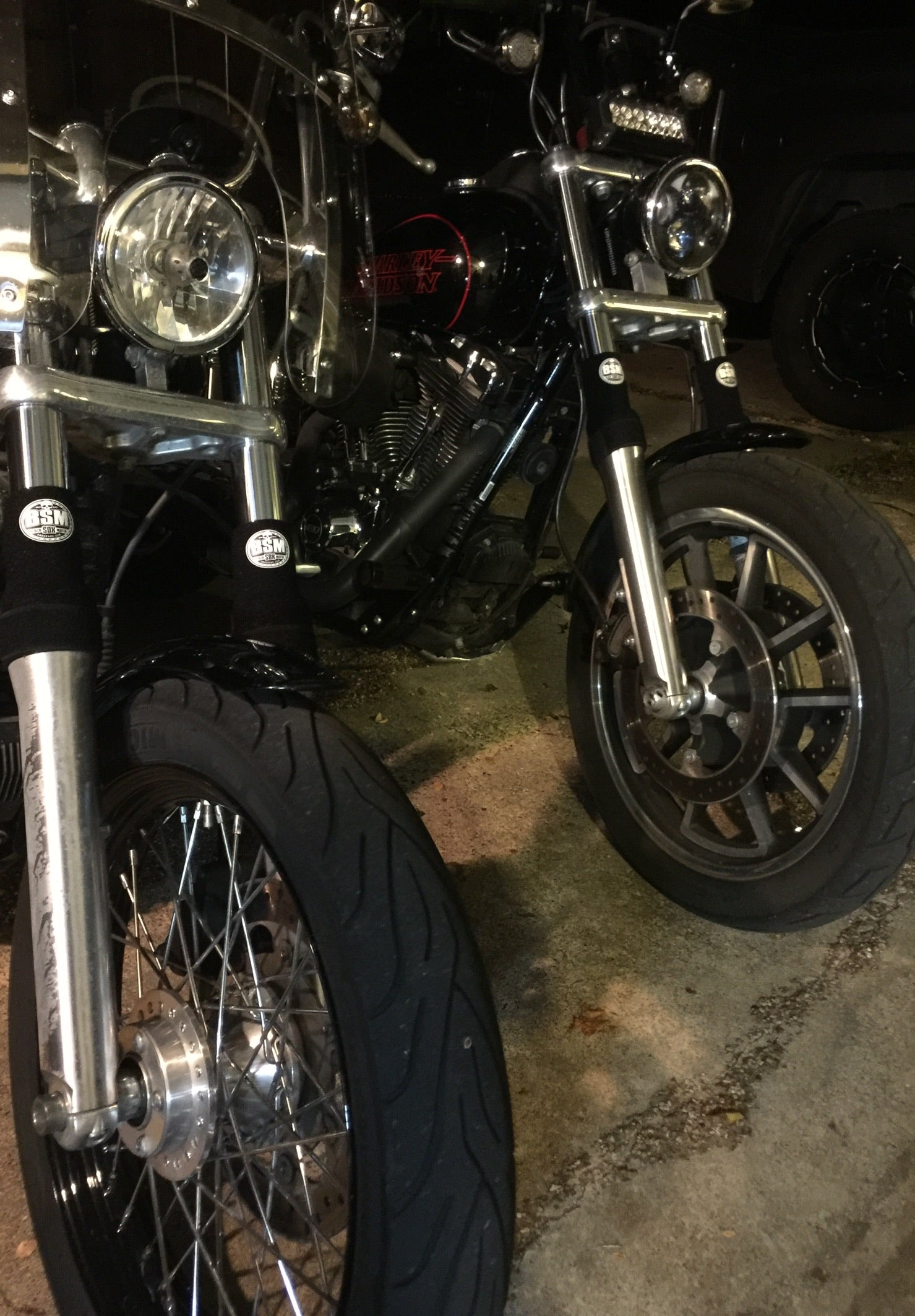 A picture of a street bike with black Shock Sox on it.