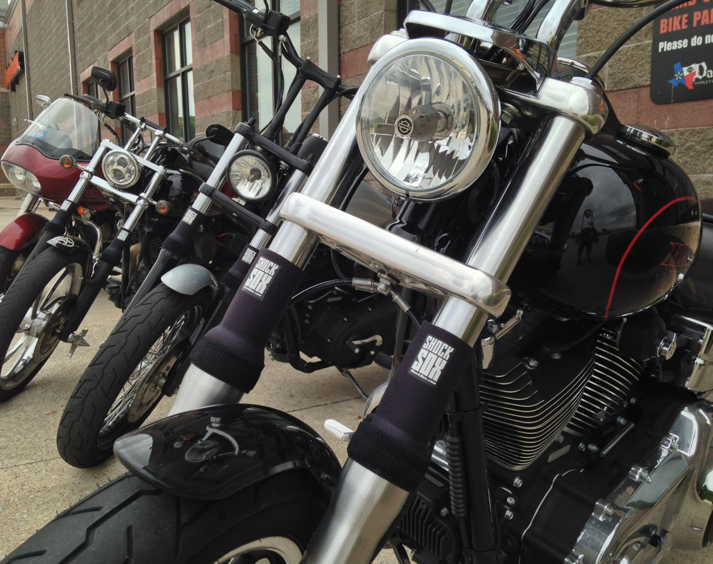 A picture of a street bikes with black Shock Sox on them.