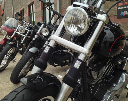 A picture of a street bikes with black Shock Sox on them.